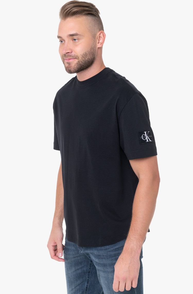 Black T-shirt MONOLOGO BADGE OVERSIZED TEE Calvin Klein, Short-sleeved black  T-shirt MONOLOGO BADGE OVERSIZED TEE Calvin Klein, Short-sleeved | Denim  Dream E-pood
