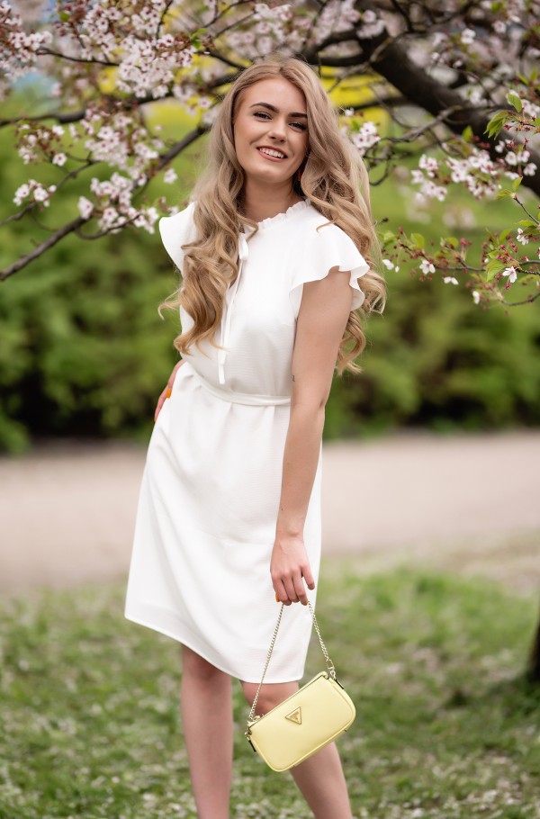 Dream of shop wearing white dress