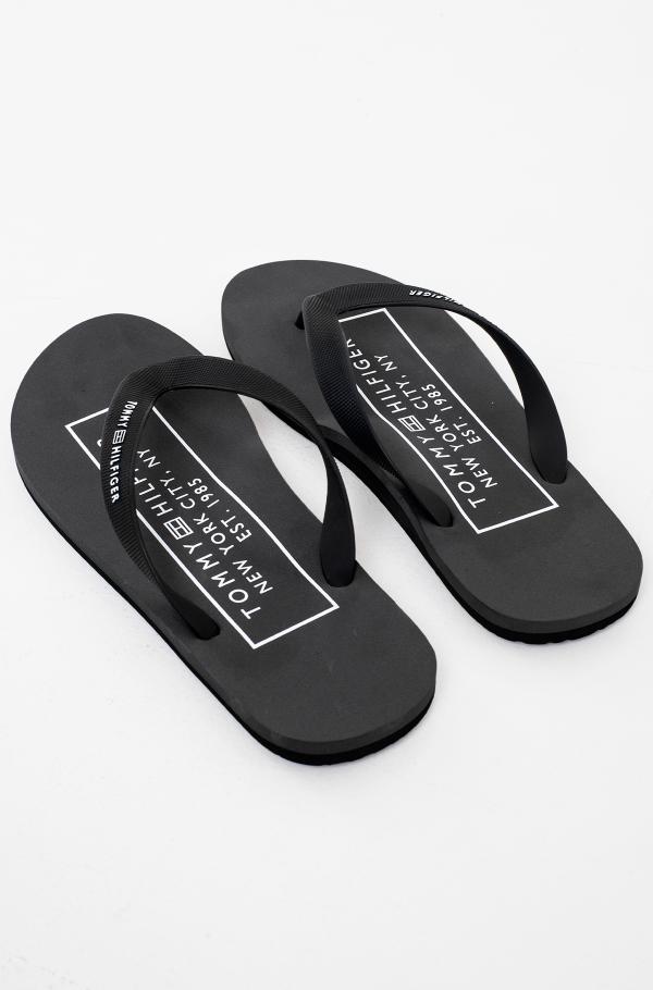 Tommy hilfiger black flip hot sale flops